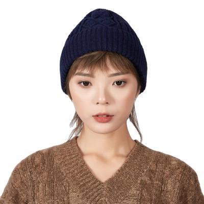 China Korean COMMON COMMON Twist Cap Winter Brimming Knitted Warm Hats For Women Custom LOGO for sale