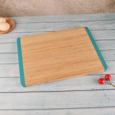 China Sustainable Wholesale Bamboo Wood Chopper Cutting Board With Silicone Edge for sale