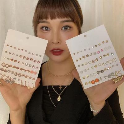 China 30 Pairs TRENDY Single Pearl Diamond Earrings Korean Women's Gold Jewelry Fashion Earrings 18k for sale