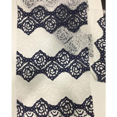 China Sustainable DIY Colors Knitted White And Black Nylon Polyester Swiss Lace Fabric For Women Dress for sale