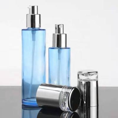 China 60ml Cosmetic 80ml 100ml Customized Round Pump Sets Silver Clear Cheap Cosmetic Bottles And White Cream Container Bottled Jars for sale