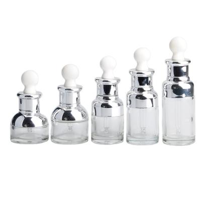 China Custom New Design 5ml 10ml 15ml 20ml 30ml Clothing Dropper Glass Bottle For Essential Oil With Fragrance for sale