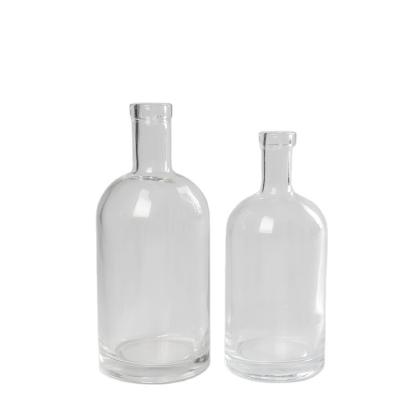 China 500ml Garment Corked Round Glass Bottle For Vodka Whiskey Rum Gin for sale