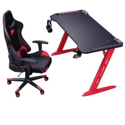 China Professional 48 55 Gaming Table Gaming Desk 6-Color LED Lights Home Office Z-Shape Desk for sale