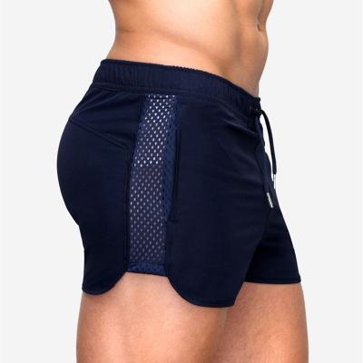 China new stretch surfing men's summer European and American Amazon fitness gym sports shorts Anti-wrinkle beach pants for sale