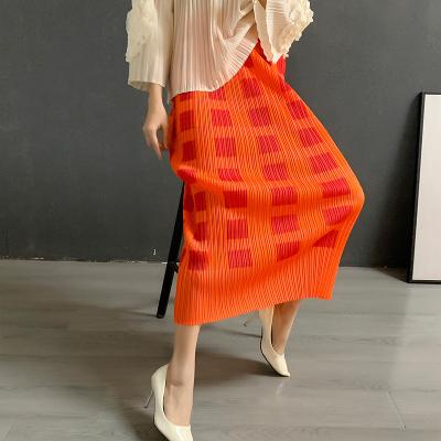 China FXZ breathable 2022 spring summer miyake pleated skirt orange print straight pleats please women skirts for sale