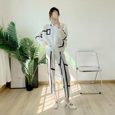 China FXZ QUICK DRY miyake pleated cardigan suit 2022 new size two-piece set fashion temperament women looser white pleats for sale