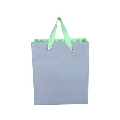 China Small Biodegradable Promotional Custom Delicate Paper Gift Bag With Handle for sale