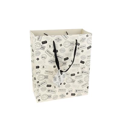 China Hot Selling Biodegradable Custom Printed Paper Bag Gift Hot Selling Bag for sale