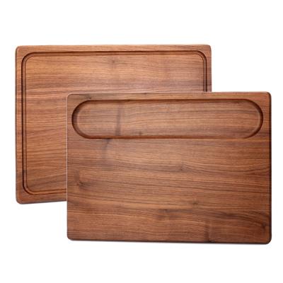 China Disposable Premium Art Refined Taste Kitchen Cutting Plate Walnut Wood Cutting Board for sale