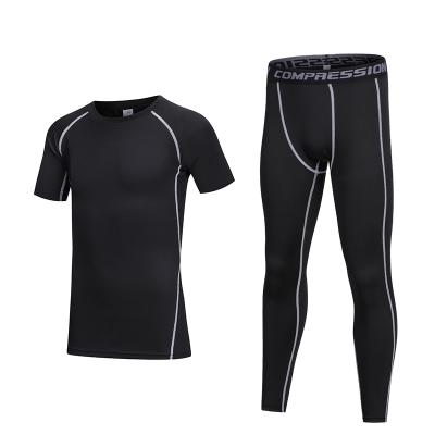 China Breathable Sporty 4 Pcs Stretch 2 Way PK Boys Compression Gaiters And Short Shirts Sets Long Pants Running Tights Set for sale