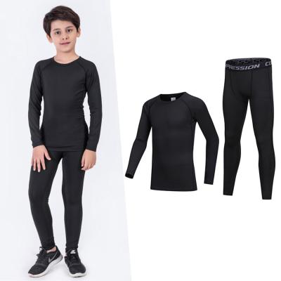 China Breathable Sporty 4 Pcs Stretch 2 Way PK Boys Compression Leggings And Long Shirts Sets Long Pants Running Tights Set for sale