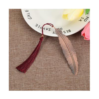 China China factory sale cheap modern gold feather landmark with tassels for sale