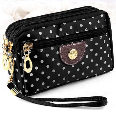 China New 3 Zipper Fashion Ladies Canvas Wallet Ladies Cloth Fabric Ladies Wallet Money Bag Floral Girl Wallet Coin Purse Wrist Purse Handbag for sale