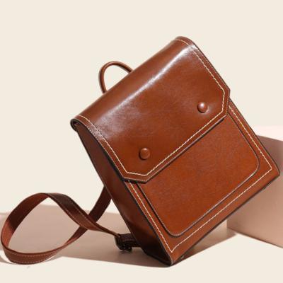 China New 100% Anti-theft Genuine Leather Women Backpack School Bag Designer Shoulder Bag Women Casual Multifunctional Female Travel Backpack for sale