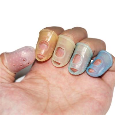 China Anti-Slip Durable Flexbale Silicone Finger Cover Protector For Paging for sale