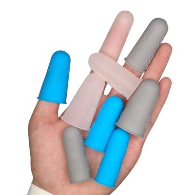 China Prevent Injury New Product 2019 Finger Tip Gloves Silicone Reusable Finger Protector For Finger Typing Cover for sale