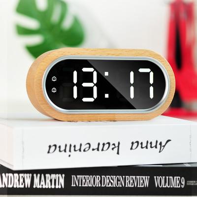 China Modern Led Wooden Clock Temperature Electronic Home Automatic Lightweight Dual Sensing Alarm Clock for sale