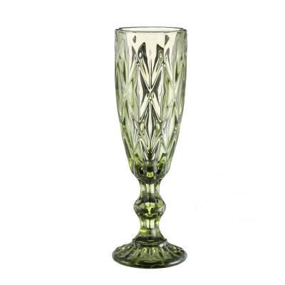 China Good quality retro colored 150ml wine glasses for party and wedding embossed champagne flute glass supplier for sale