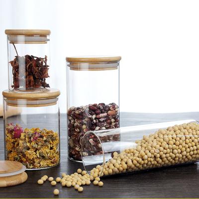 China Freshness Preservation Glass Storage Jar With Storage Container Bamboo Vessels Food Glass Lid Candle Jar Wholesale Price for sale