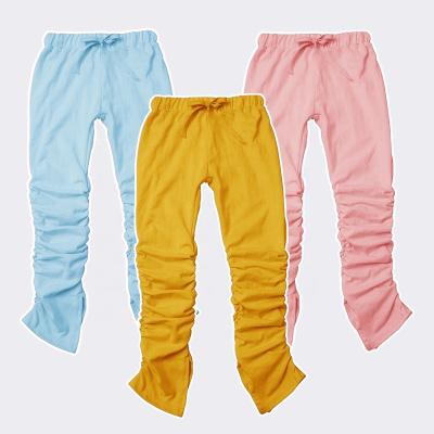 China Anti-pilling 100% cotton piled up leggings for kids fall clothing girls pants solid ruched toddler kids piled up jogger pants for sale