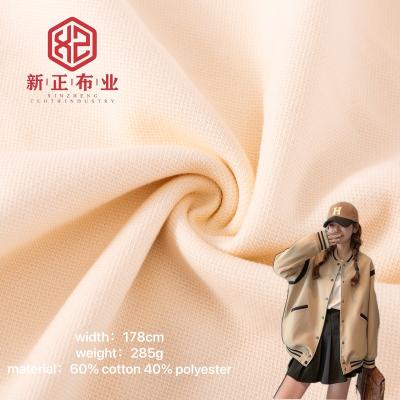 China Anti static 40% cotton and 60% polyester high elastic pearl layer polyester cotton ground to air fabrics for baseball jerseys for sale