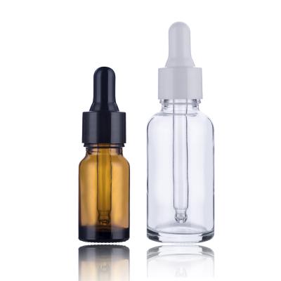 China Cosmetic in 1oz 2oz 4oz 8oz 16oz 32oz round boston stock clear glass bottle with amber plastic dropper straight glass pipette for cbd oil for sale