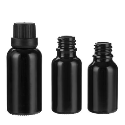 China 5ml 10ml 15ml Cosmetic Black Essential Oil Bottle Empty Glass Perfume Bottle With Screw Cap for sale