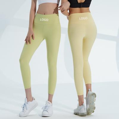 China New Breathable 2022 Elastic Spring Lulu Color Naked Feeling Strong 7 Point Hip Sports Fitness Yoga Pants Lift Up Quick Dry Pants for sale