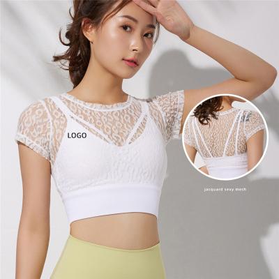 China Breathable Jacquard Lace Sports Top With Cushion Yoga Shorts Sleeve Thin Fit Breathable Running Fitness Top for sale