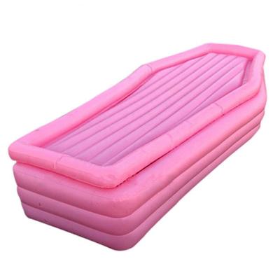 China Customized PVC inflatable coffin swimming pool float for sale