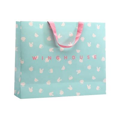 China Recyclable Adorable Fancy White Paper Shopping Bag With Cotton Handle, Big Logo Printing On Front Side Paper Bag for sale