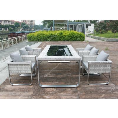 China Weather Resistant Aluminum Wicker Garden Sets Outdoor Furniture Outdoor Table Set Rattan 8 Dining Set for sale