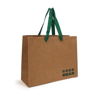 China Recycled Materials Brown Kraft Paper Shopping Custom Printed Bag With Handles Paper Bag Custom Printing Logo for sale