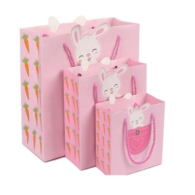 China Recycled Materials Manufacturer Printed Pink Cardboard Luxury Paper Gift Bags Personalized Logo Shopping Bag With Handle for sale