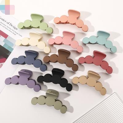 China Hot Selling Environmental Friendly Ins Plastic Solid Matte Hair Clips 10cm Color Simple Retro Hair Claws For Women for sale