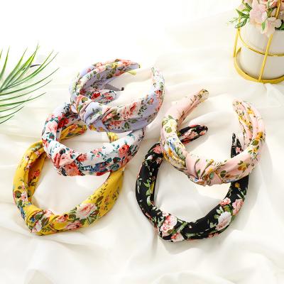 China New Style Floral Printing Simple Knotted Wide Headbands Environmental Friendly Korean Fabric Headbands For Women for sale