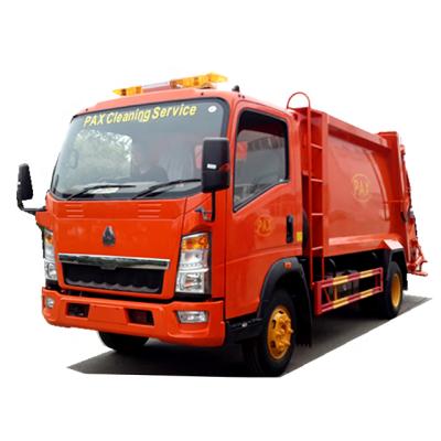 China Factory Howo 7cbm compactor garbage truck 6tons sanitation garbage trucks for sale in Kenya for sale