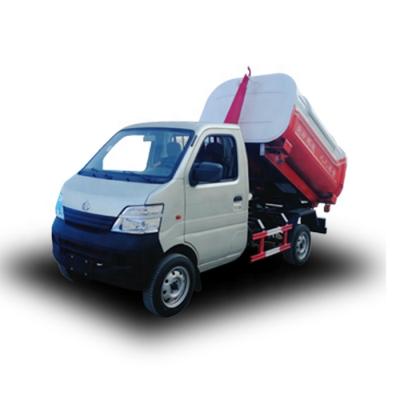 China Factory Chang'an hook arm type small garbage truck with former forming and pressing garbage bin for sale