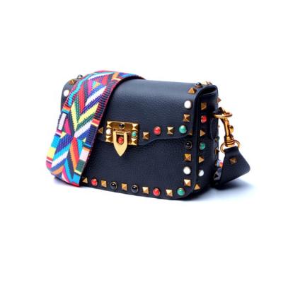 China Fashion 2019 new ladies color rivet European and American cross small square bag of cowhide leather - body bag for sale