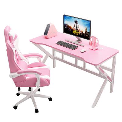 China Simple style comfortable k-shaped girl's princess wooden game table easy to assemble the latest computer table game customized pink physical channels table for t for sale