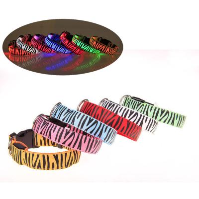 China Hot sale fashion pet products padded zebra-stripe led lightweight adjustable dog collar pet collar for dog for sale