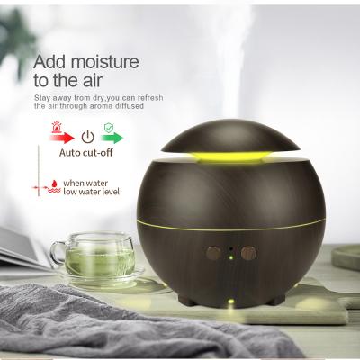 China Hot Sale 600ml Hotel Humidifier Essential Oil Humidifier Ultrasonic Sunset Light Humidifier for sale