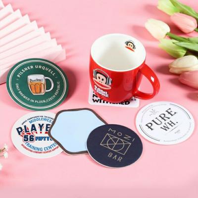 China Viable Custom Round Cardboard Coasters White Christmas Cup Coasters Bulk Cup Coasters for sale