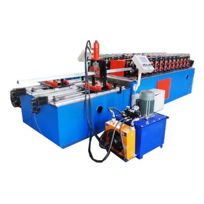 China Metal Stud And Track Light Steel Keel Roll Forming Machine 915mm Feeding Width 0.3-0.8mm Rolling Thinckness for sale