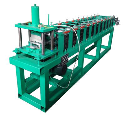 China Steel door making machine high speed customized shutter door roll forming machine zu verkaufen