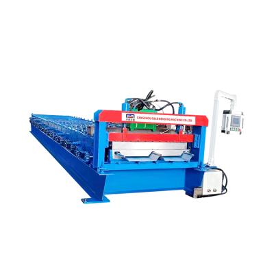 China hot sale cold roof sheet machine cladding automatic steel panel roll forming Te koop