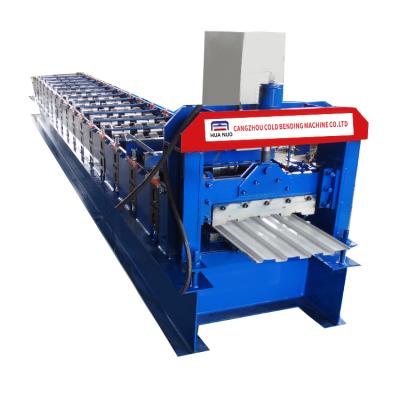 China Automatic guide roller shutter door making roll forming machine Te koop