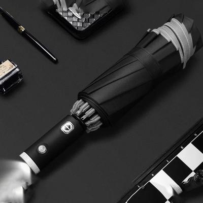 China CLASSIC Reverse folding umbrella 12K windproof safety reflective LED handle 3 folding automatic intelligent anti-umbrella for sale