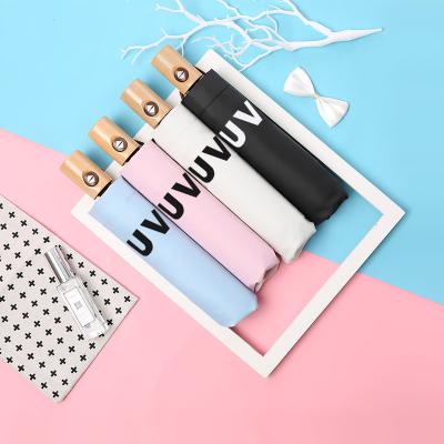 China CLASSIC Custom logo packing Auto Foldable Umbrella Windproof Travel Umbrella Compact wooden log handle Folding Umbrella for sale